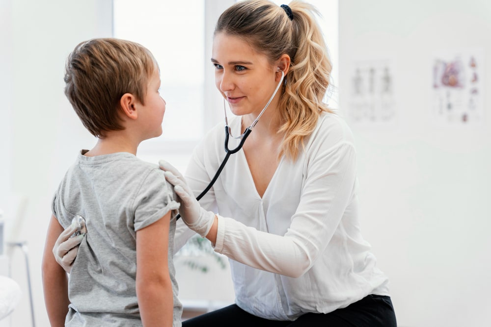Pediatrician with child